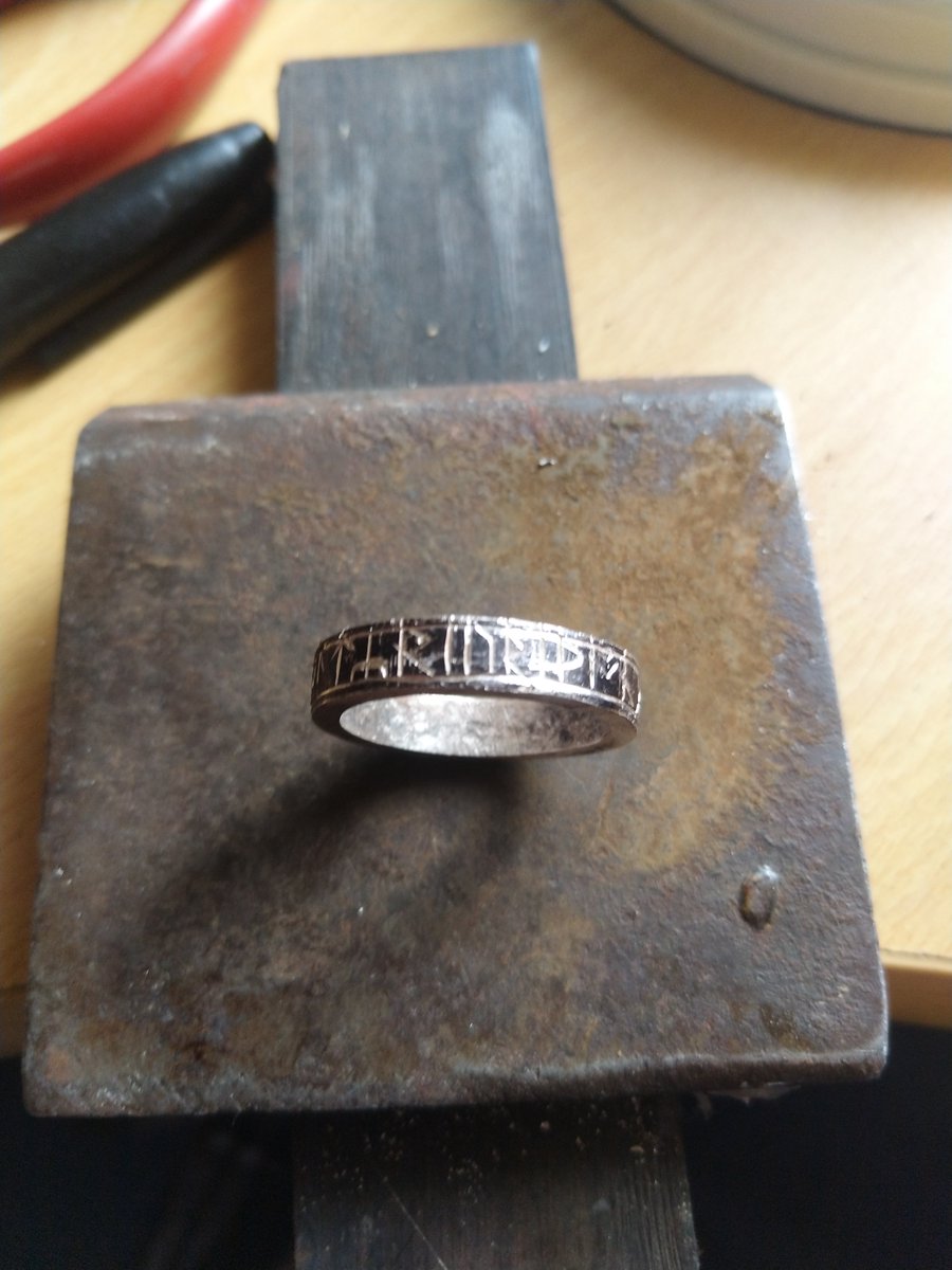 After maybe an hour, I was done, and ground off the black. As you can see, the ring looks very rough, so it needs to be 'finished'. Finishing is a broad term, and in the modern workshop, typically means 'polished', but really, it's any intentional surface.