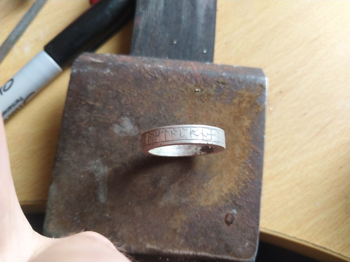 After maybe an hour, I was done, and ground off the black. As you can see, the ring looks very rough, so it needs to be 'finished'. Finishing is a broad term, and in the modern workshop, typically means 'polished', but really, it's any intentional surface.