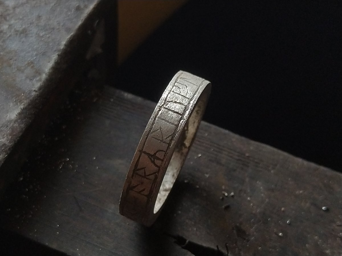 After maybe an hour, I was done, and ground off the black. As you can see, the ring looks very rough, so it needs to be 'finished'. Finishing is a broad term, and in the modern workshop, typically means 'polished', but really, it's any intentional surface.