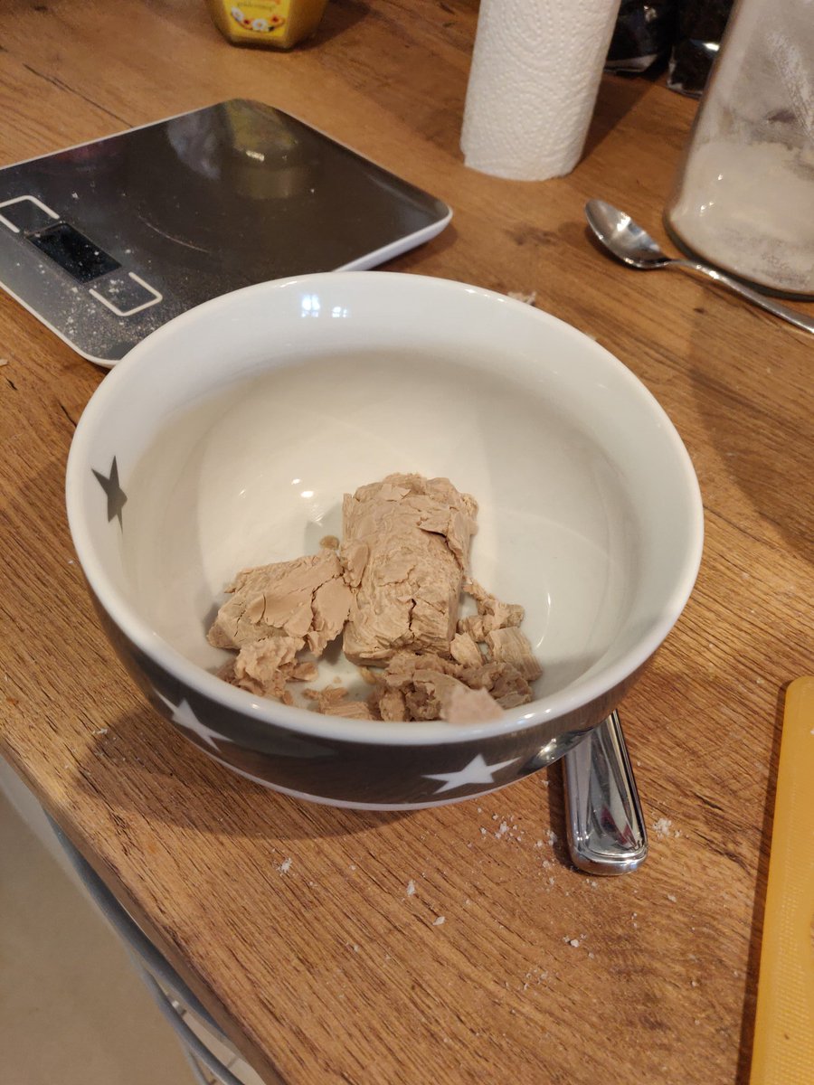 This is the risky part. I do not have any experience baking with fresh yeast. It smells funny. I'm about to dissolve it in tepid water. How warm is tepid?  Here goes...