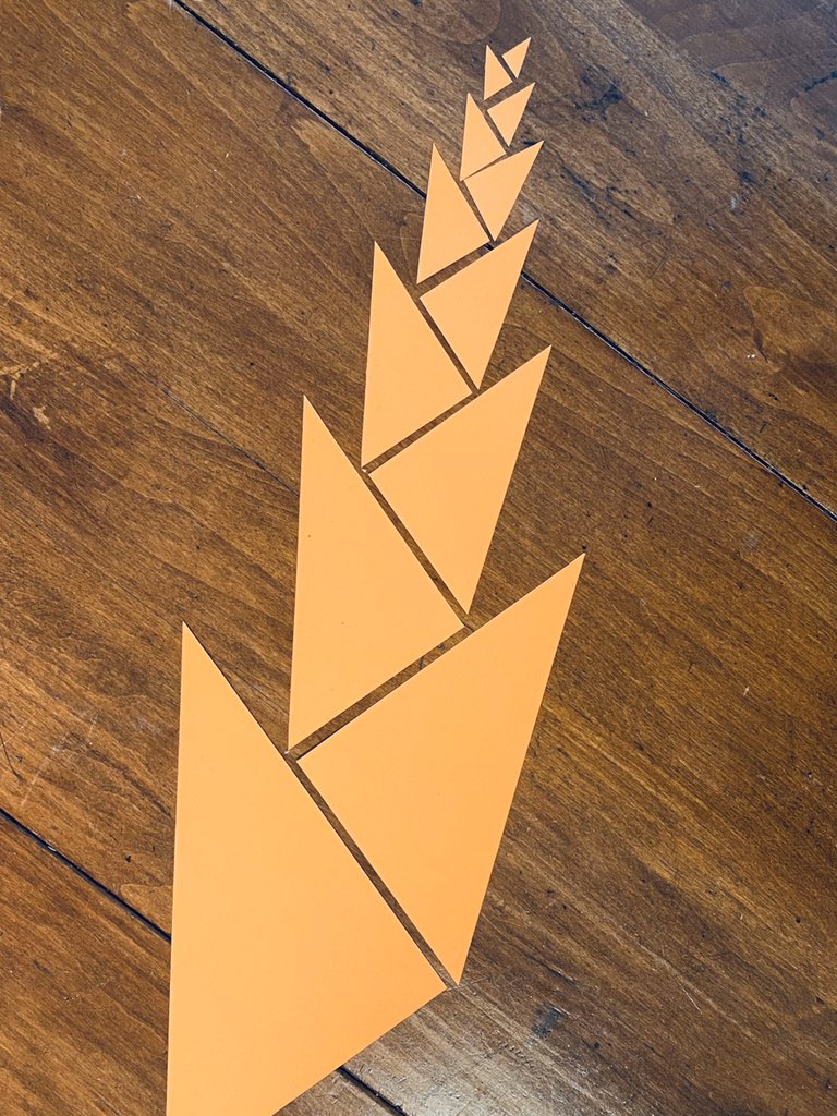 I made some similar right angles triangles from red and orange card for today’s  #mathartchallenge from  @anniek_p.Here is a thread following some of my explorations.