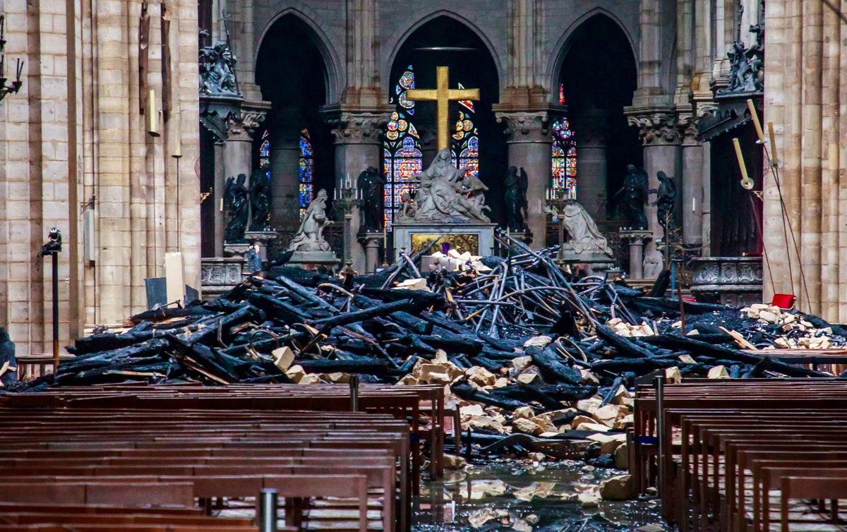 Fire fighters were able to extinguish the blaze after a heroic 15-hour battle. Although the roof was gone and the spire had collapsed, crashing through the stone vaulting below, they had averted complete structural collapse. Notre Dame was saved.