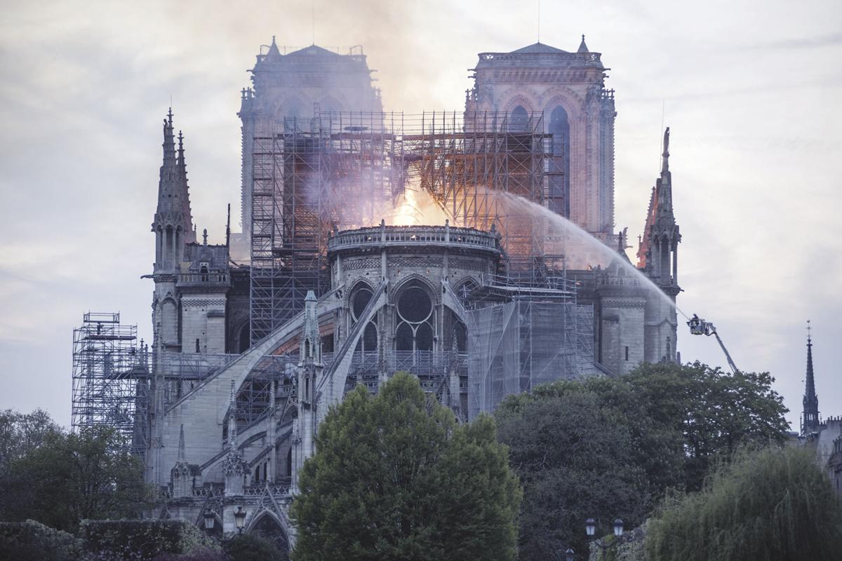 At the time of the fire, it wasn’t even that hard—scaffolding reached down to ground level. And in fact lots of people climbed it in the year leading up to the fire. https://www.lci.fr/social/notre-dame-de-paris-un-chantier-monumental-2118163.html