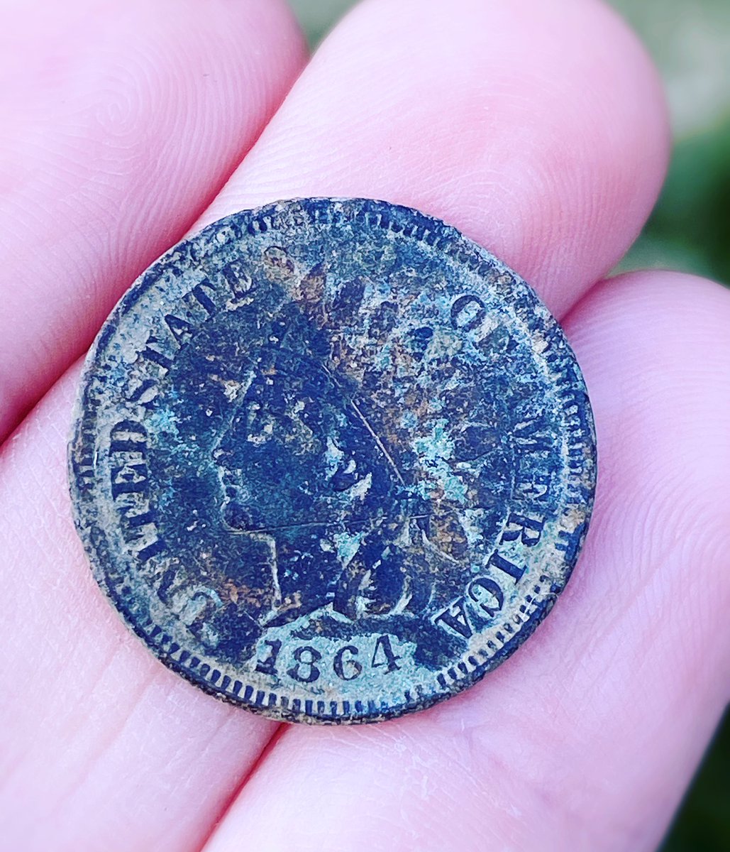 Silverslingers's tweet photo. Metal detecting the woods —> 1864 Indian Head Penny! 🖤🖤🖤
#metaldetectingfinds #metaldetecting #metaldetector #metaldetectors #oldcoins #dirtfishing #relichunting #treasurehunt #diggers #history #indianhead #indianheadpenny #whiteselectronics #mxsport #besthobby https://t.co/qAtdxIqwGl