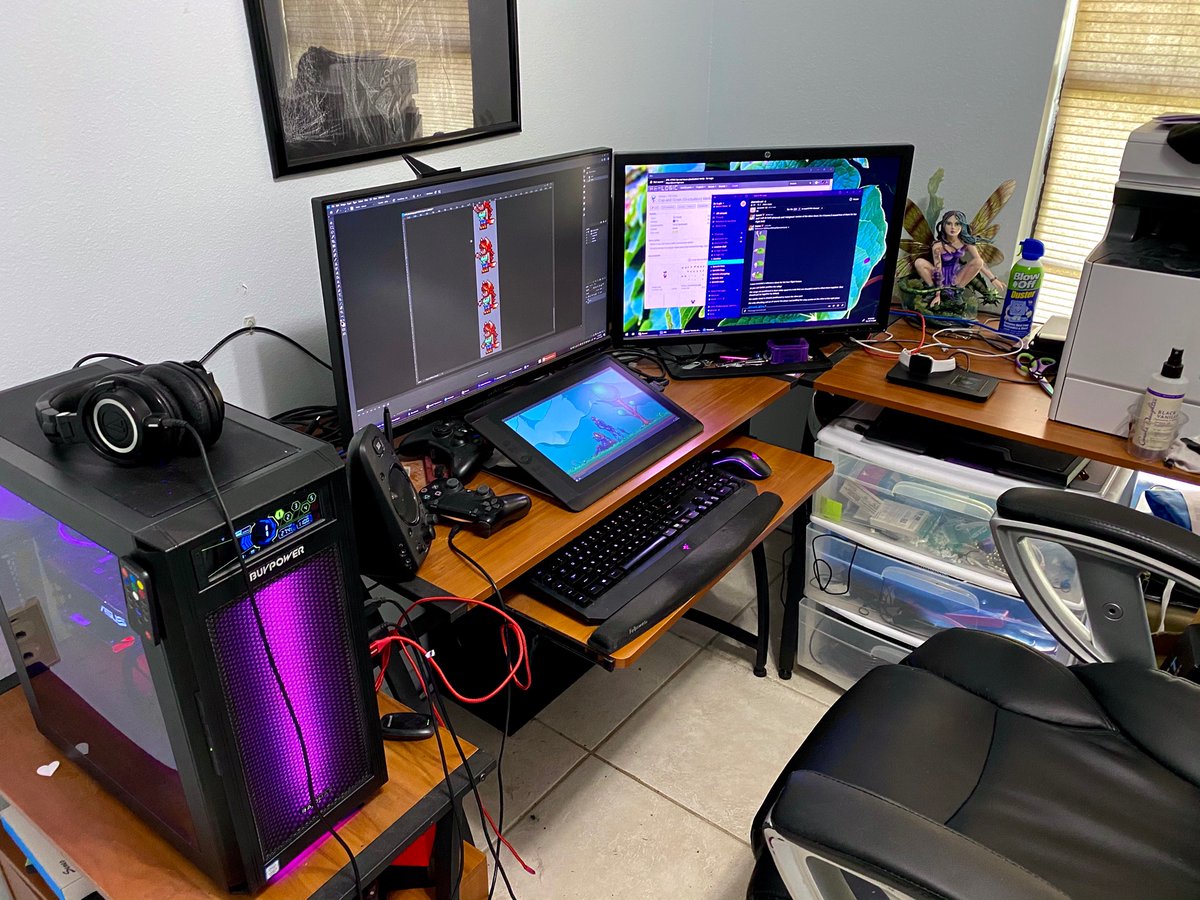 Lazure_Terraria's tweet photo. @Demilogic Setup is pretty boring. Never had the chance to pretty up my office. Pixel pieces on main monitor, digital painting pieces on cintiq, and communication and other collab tools on second monitor. https://t.co/UFoXE5rOYK