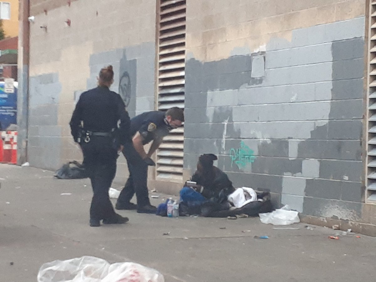 HomelessnessSD's tweet photo. An army of police out today clearing homeless people off the sidewalks. #Easter #HomelessSweep #CoronavirusUSA https://t.co/vQ3ZbKfVJH
