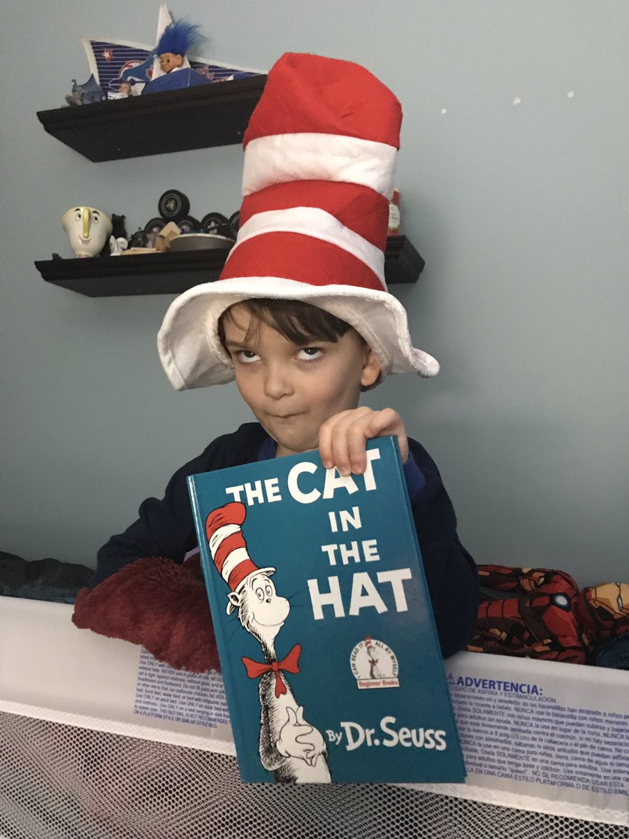 Logan trying to make a funny face. He always loves the hat and book from <a href="/JRetting/">Jolanda Rettinger</a> and the Rettinger family. <a href="/Josh_Retty/">Joshua Rettinger</a>