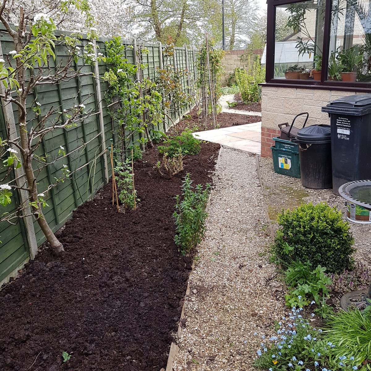 AndyTrewin's tweet photo. We have been following HMG advice and while I have been repairing and painting the fence panels, my adorable Wife has been doing her favorite hobby gardening - lots of veg about to get planted!  Please stay safe. https://t.co/kZWzW3UzBB