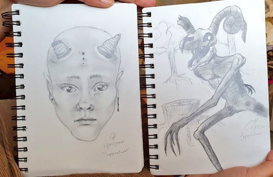 Oh. Yesterday my bf and I gave ourselves 40mins to do a drawing. My brother gave us the prompt "Supernatural". This is what we came up with.I like my bf's piece better (right)