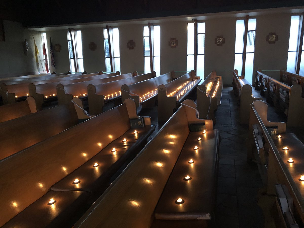jenfulwiler's tweet photo. For Easter Mass, @FrHarrison put candles in the pews - one for each family in the parish https://t.co/qIKLhMe6zO
