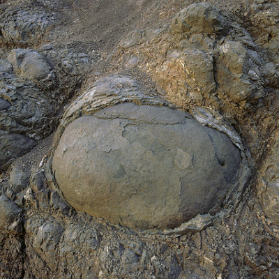 Type: onion-skinned weathering of massive rocks (including sandstones and granites).How: formed by weathering along spheroidal fracture planes within the rock massWhy is bad: it's rock, so will break your teeth, and doesn't at all taste like chocolate(2/n)