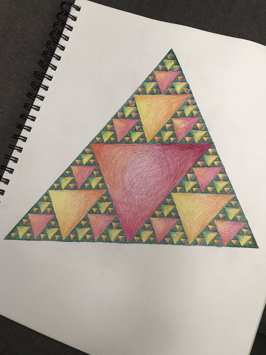 AprilKoenig4's tweet photo. I asked students to create a Sierpiński triangle this week and decided to create one of my own. The time I spent drawing was much needed. #VPStaysHome https://t.co/eviVUo4mTD