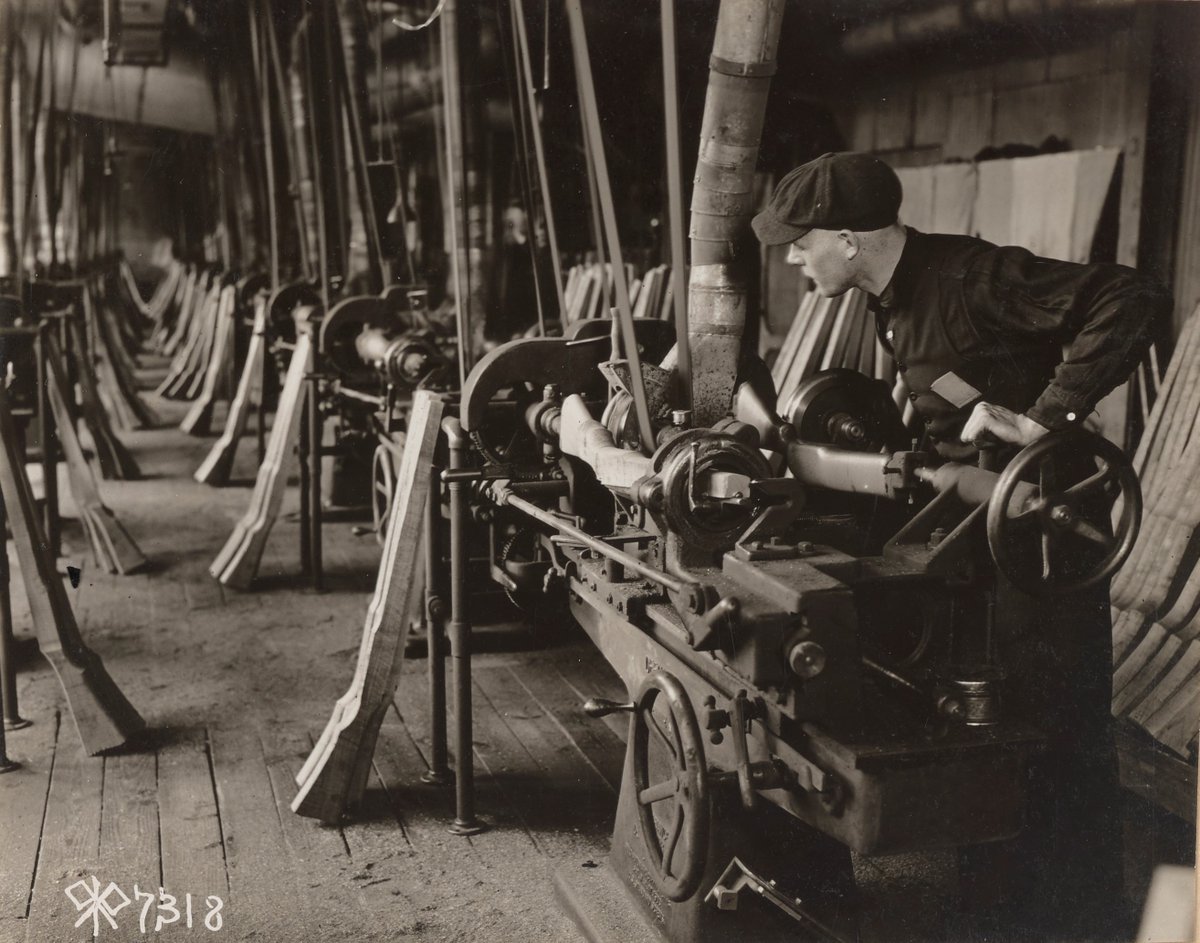 Turning lathe at work on stocks:  https://catalog.archives.gov/id/55175430 