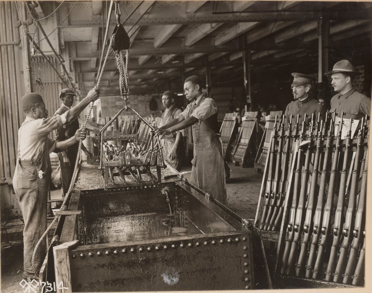 Dipping rifles in oil before shipping:  https://catalog.archives.gov/id/55175422 