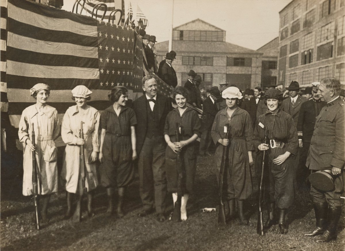 Secretary of the Navy, Daniels attended the ceremonies which marked the delivery of one million rifles to the Government within a year by the Midvale Steel Company, Eddystone, PA. Secretary Daniels is shown with a few of the women workers in the plant:  https://catalog.archives.gov/id/45535026 