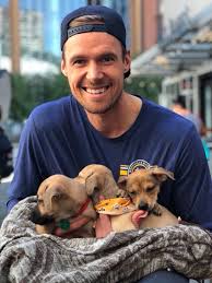 Pekka is a good and handsome man who sometimes doesn't wear shirts for photos, or who poses with an armful of puppies.