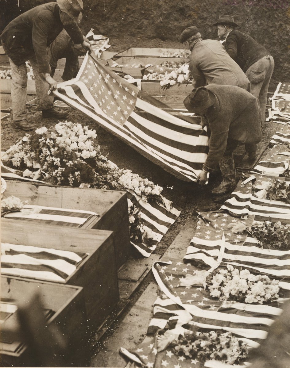 Burying the unidentified victims of the Eddystone Munitions disaster, April 13, 1918:  https://catalog.archives.gov/id/31478088 