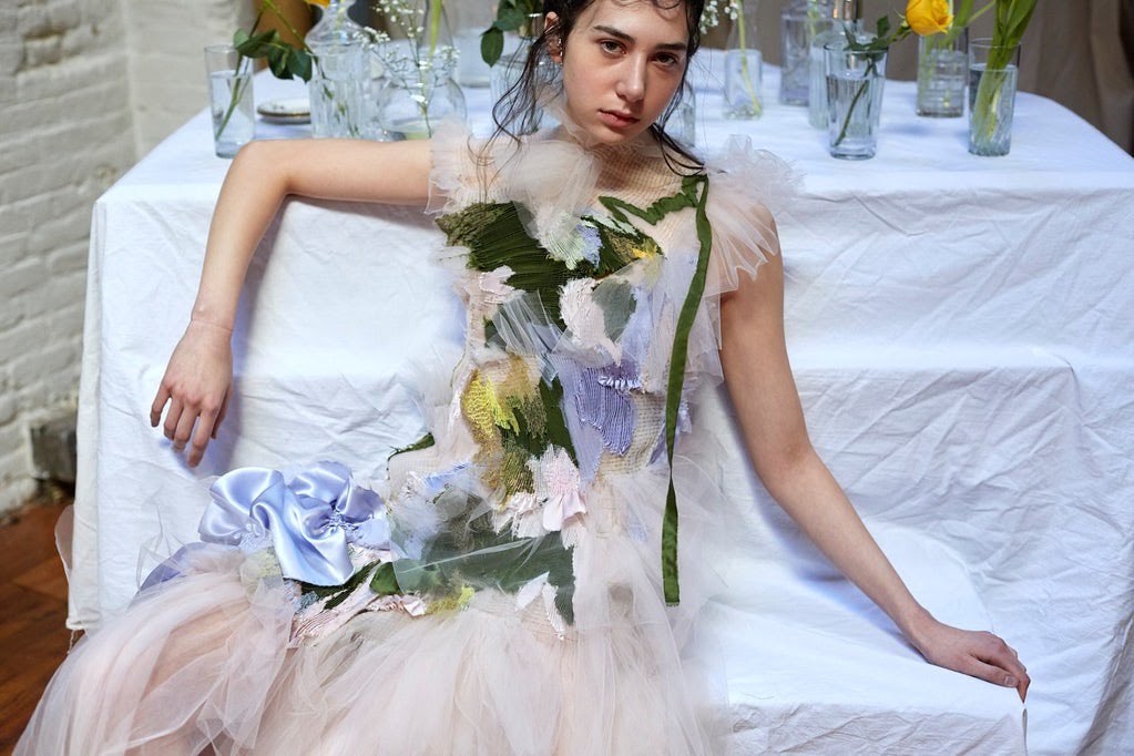 Caroline Hu- B.A. in fashion design at Central Saint Martins and M.A. in fashion design at Parsons- roots her design in romanticism - emphasizes on intricate design through mixing many textiles