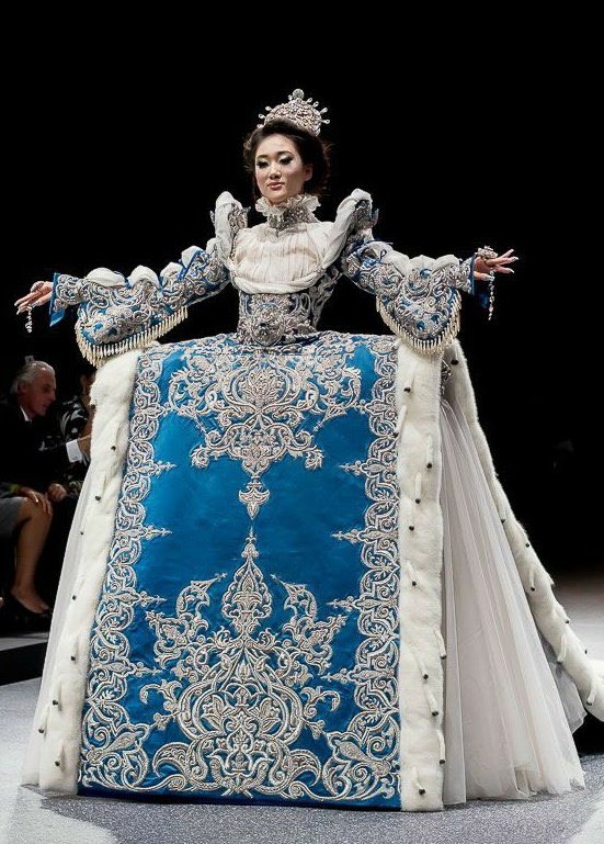 Guo Pei- china considers pei their first master couturier- deviates from all trends, aims to create heirlooms- wants to show the strength of women by creating heavy multilayered designs- first asian woman to be a guest member of the Chambre Syndicale de la Haute Couture