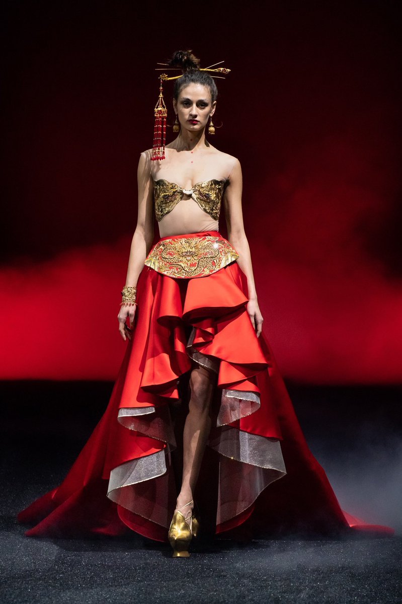 Guo Pei- china considers pei their first master couturier- deviates from all trends, aims to create heirlooms- wants to show the strength of women by creating heavy multilayered designs- first asian woman to be a guest member of the Chambre Syndicale de la Haute Couture