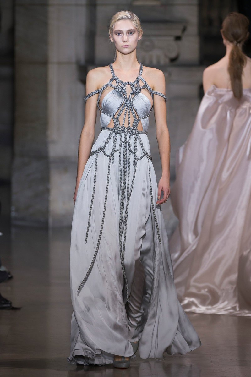 Yiqing Yin- official member of the Chambre Syndicale de la Haute Couture.- aims to make her clothing “a second skin and flexible armor” - designs display motion and fluidity