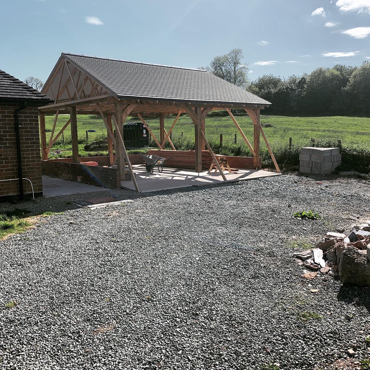 A pair of open double garages we built last year