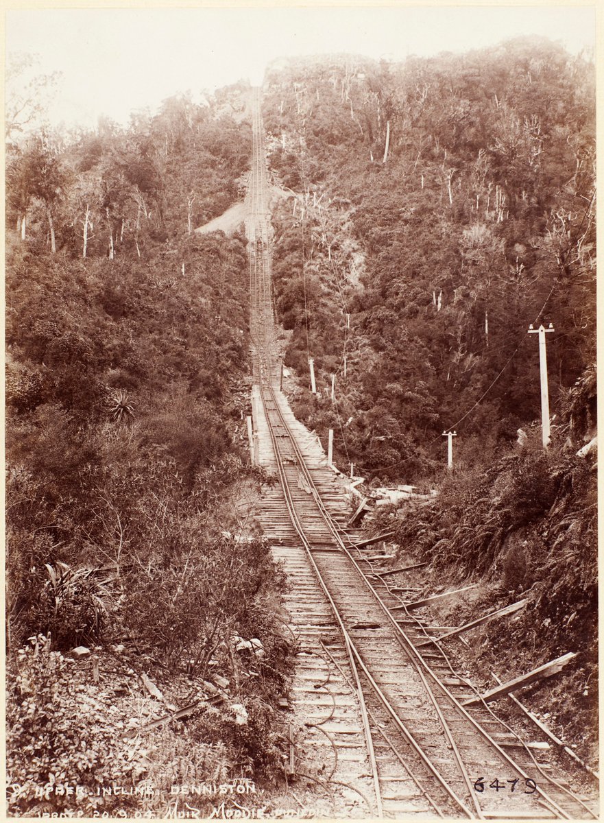 The "eighth wonder of the world" lured me to Denniston: a precipitous rope incline that carried coal wagons between the Denniston mines and the railway 518m below at Conns Creek. It ran 1879–1967. Two pics c.1900s: full incline (NLNZ 1/4-055918-G); upper part (Te Papa O.036708).