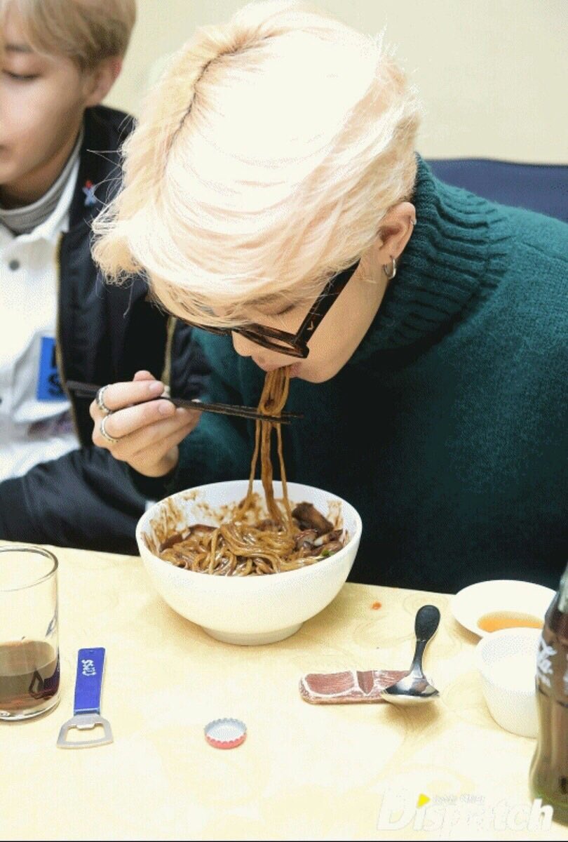 A boy and his black bean noodles