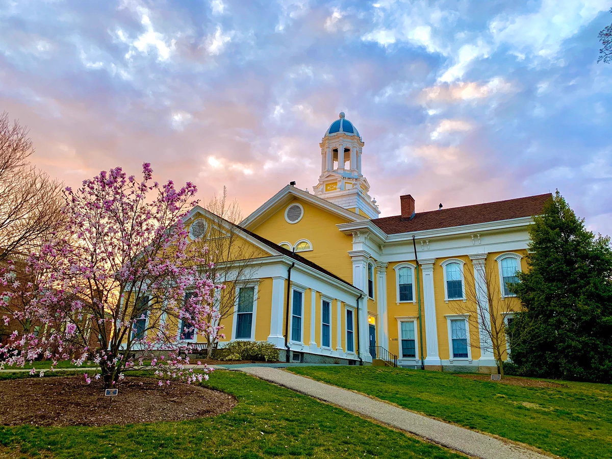 Colorful sunset over a yellow building