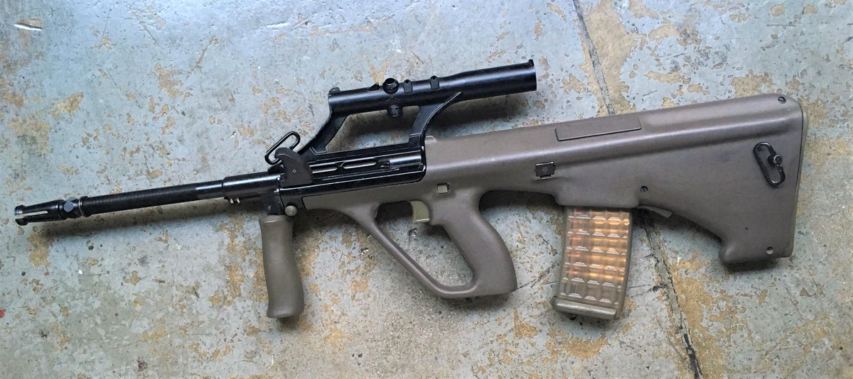 1. Steyr AUG. This is the ugliest gun ever made. This gun is butt ugly. When I think of "ugly gun" i immediately think of the AUG. looks like a goddamn paintball gun. looks so flimsy, like you could bend it. fuckin destiny 2 lookin squirt gun