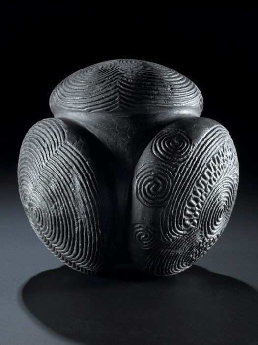 Mysterious 5000 year old Neolithic carved stone ball from Towie, Scotland with spiral designs. Over 430 examples have been found, with varying form, purpose unknown, but inevitably described as ‘weapons’ or ‘symbols of power’. The geometry reminds me of the Platonic Solids.