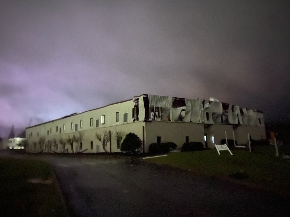 AngelaMoryanTV's tweet photo. Devastating views of Grace Baptist Academy on Shallowford Rd. Every building has SUBSTANTIAL damage. Sign for the elementary school flew across the street and down the road. https://t.co/NP5VS8aBRg