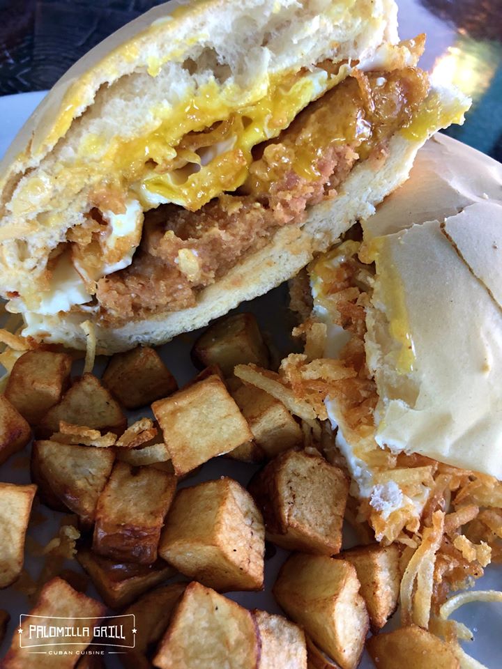 PalomillaGrill's tweet photo. Start off the week with our #CroquetaSunrise. Two ham croquetas, fried egg, cheese and julienne potatoes on a Cuban bun with a side of home fries. 😋 Takeout, curbside pickup and delivery available. 🚚💨 📞 305-261-3424

#croqueta #freshfromflagami #cubancuisine #palomillagrill https://t.co/D5tSpM2i3p