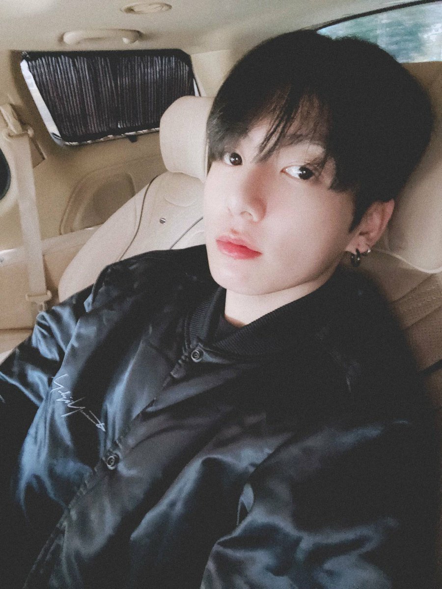 A SELCA OF HIM WEARING BLACK