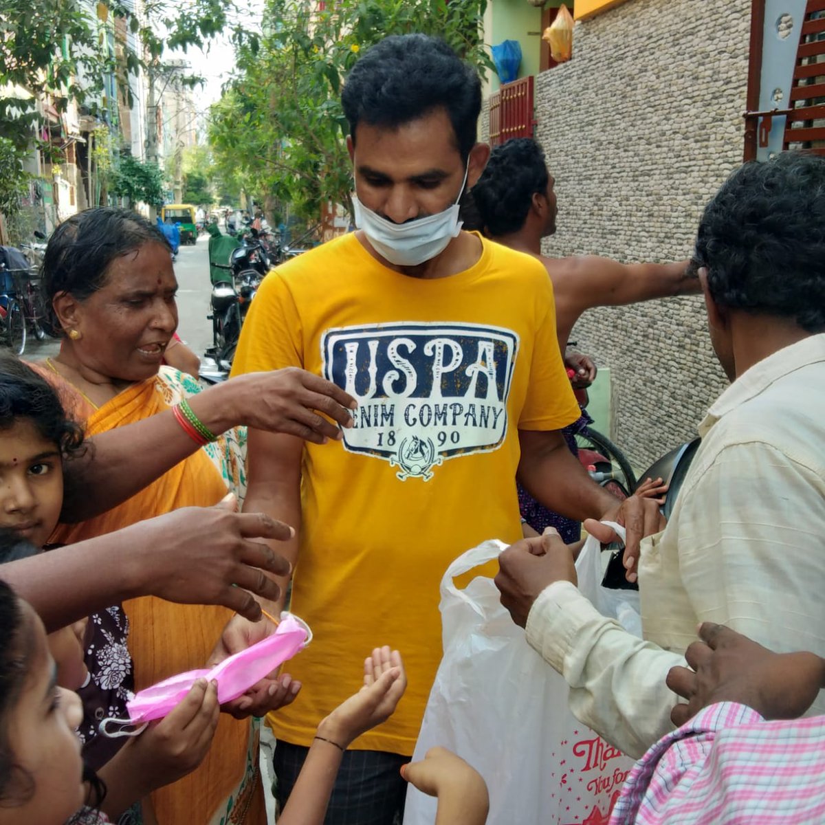 Vijayawada  #Prabhas fans donated Sanitizers & mask for poor people