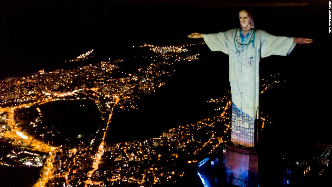 cnni's tweet photo. Brazil's Christ the Redeemer statue was illuminated to look like a doctor on Easter Sunday, in a tribute to front-line healthcare workers battling the coronavirus pandemic around the world. https://t.co/oKcBWvPvlF https://t.co/j2KqTLszT1