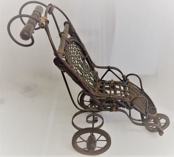We don't know an awful lot about this model wheelchair that came into our collection last year but it is presumed to be an apprentice piece. The wheelchair is of 19th century design.