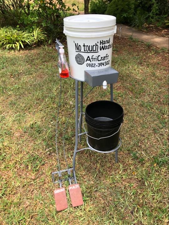 MadeByAfriCraft's tweet photo. While the cases of covid-19 are increasing in Tanzania, we are finding creative ways to stop the spread. This a No Touch Handwashing Unit that operates with foot pedals! https://t.co/vQTKOakyNn