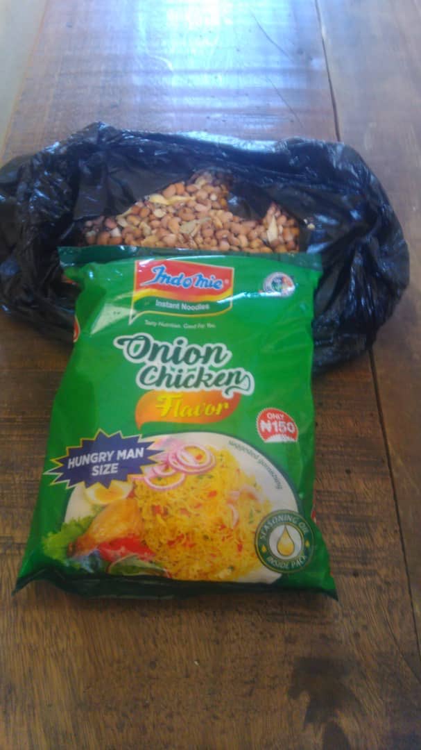 TrackaNG's tweet photo. Dear Gov @jidesanwoolu

One hungry man size Indomie and 3 milk cups of beans. 

This is what an 83-year-old man in Ijeshatedo got as palliative to cushion the effect of stay at home from surulere local government council. #Covid19  @Mr_JAGss @followlasg @Sadiya_farouq https://t.co/ORuyic6uHh