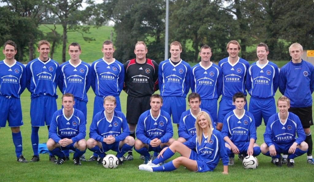 2008/09 we groundshared with <a href="/armaghcityfc/">Armagh City FC</a> because Ferney Park didn’t meet the criteria for the restructured ‘Championship 1’. Squad pictured at Holm Park with reigning Miss Northern Ireland Judith Wilson from Ballinamallard. Despite the round trip we still managed to finish 5th!
