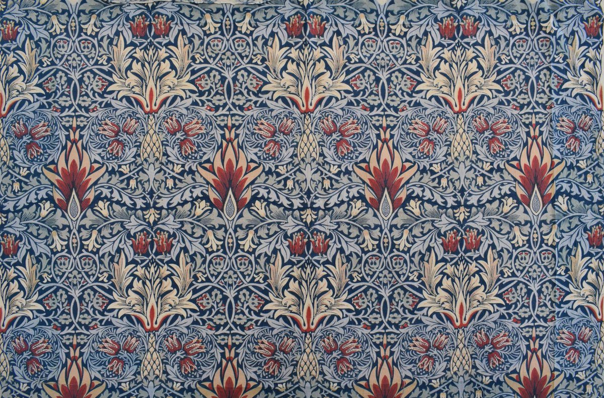 Its colors are in fact akin to those Morris used extensively at Merton Abbey starting in 1881 - deep blues, greens, reds, and yellows - as can also be seen in this slightly lighter printing. (V&A)