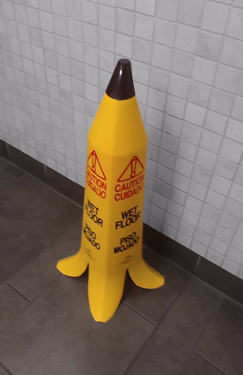 DunnyDesign's tweet photo. I’m here for this visual metaphor of wet floor signs that look like banana peels.👏👏👏 Top notch #DunnyDesign! https://t.co/EbeP7gheDA