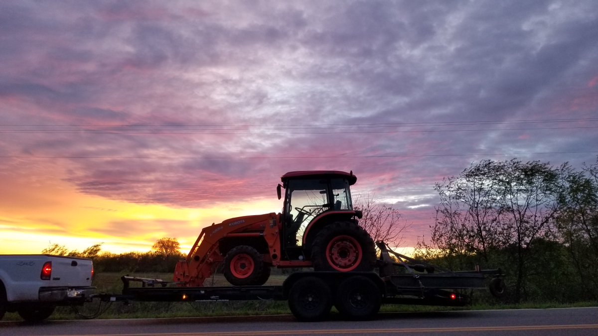 What a beautiful sunrise.  It may be cold, and it may be the day after Easter, and we may be social distancing, but we are still getting work done!  #Kubota #Tractor #Essential