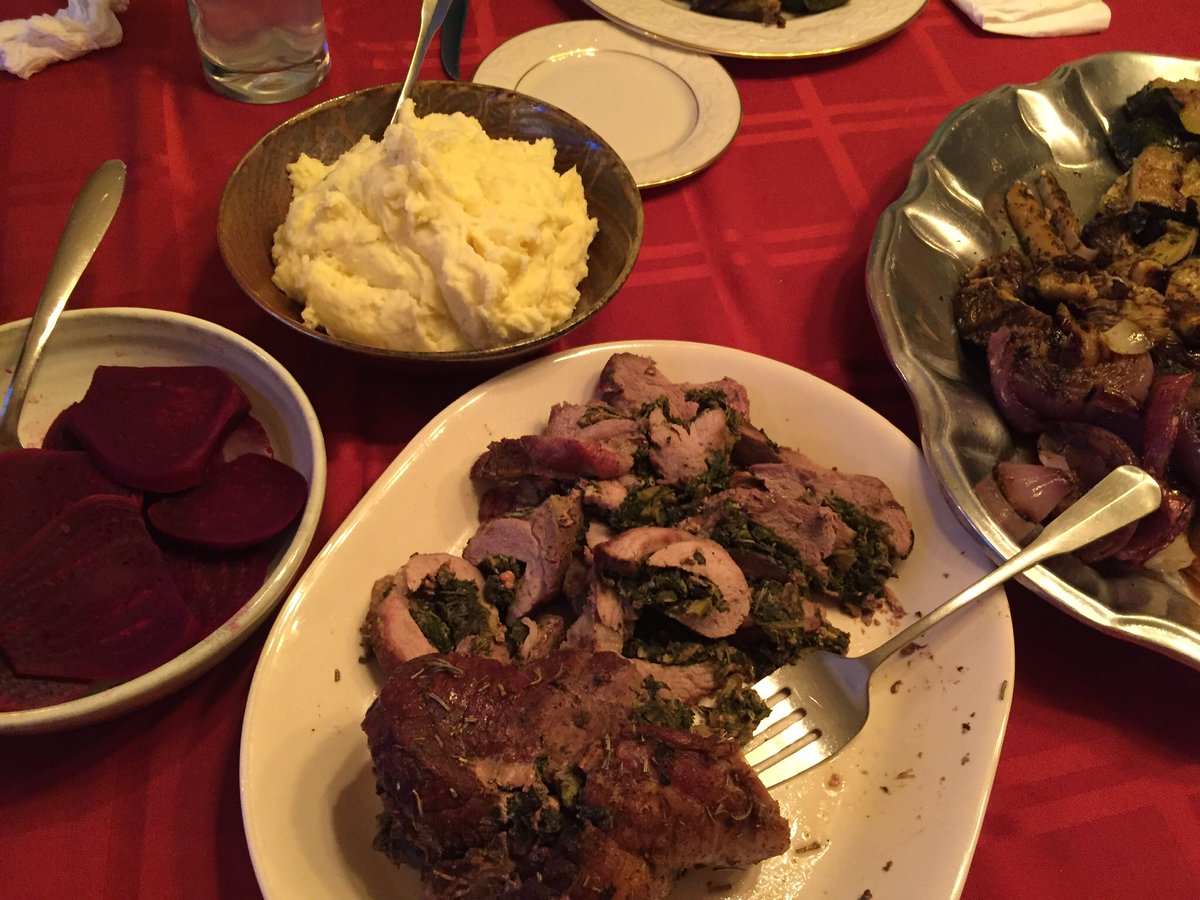 Easter dinner for 2. Tablecloth, candles, G&T, Campari & soda, with deviled egs to get started. Next up: kale stuffed butterflied leg of lamb with mashed potatoes, beets and a platter full of grilled vegetables coated with herbs in oil.  #QuarantineCuisine