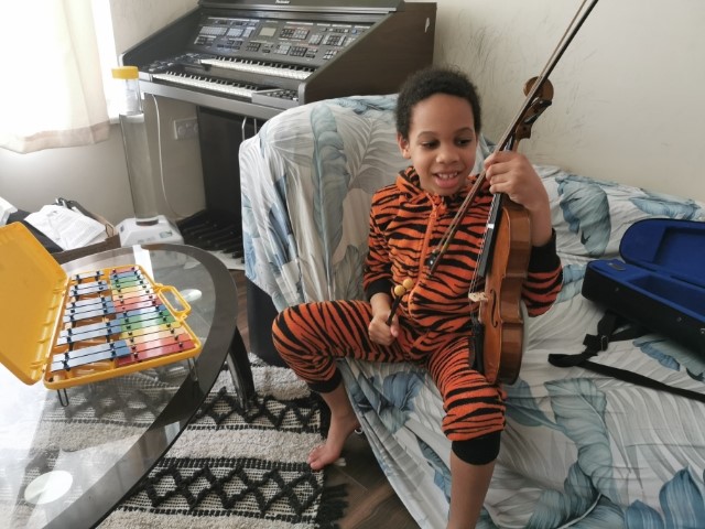 glasshouseicm's tweet image. Mario is learning to play the violin through @InHarmonyNE and he’s been busy practicing at home...

“In Harmony means to me that we play different pieces and different instruments. I want to inspire people to play the violin. I love playing my instrument.”