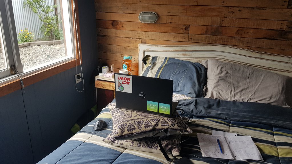 Nicola__Maher's tweet photo. My desk. #improvising #WorkFromHome #stuckinChile #WorkFromHostel https://t.co/nQzBNICuMj