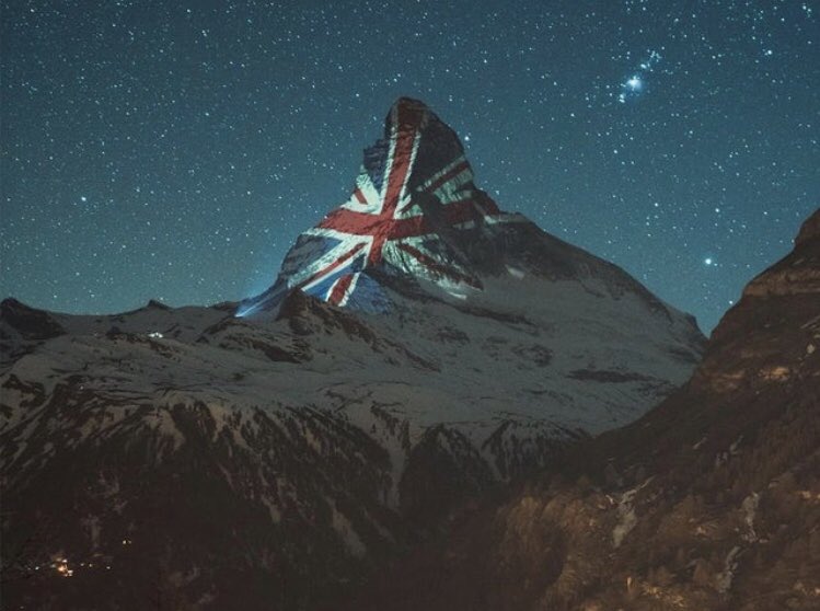 isparentmag's tweet photo. In the town of Zermatt #Switzerland they have been displaying national flags on the Matterhorn to show support during these trying times. This is one they did one for the United Kingdom! 🇬🇧 #COVID19 #UK https://t.co/dlpZ2UttEJ