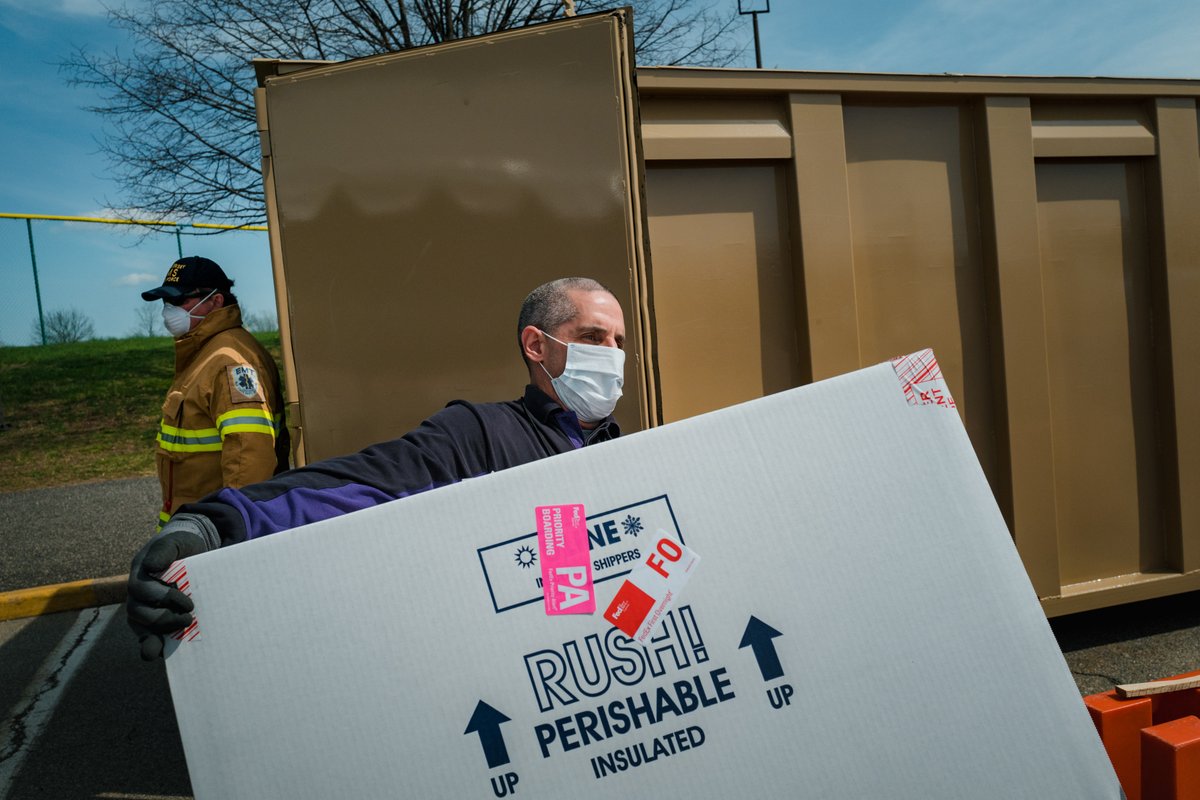 14.  @rcjonesphoto & I waited until the drive-thru closed last Tuesday. That's when Douglas Ortmann, a 20-year veteran of Fedex, showed up to pick up the samples. He makes the same run everyday: Pick up the test tubes in Paramus, NJ then drive them 14 mins to nearby Teterboro, NJ: