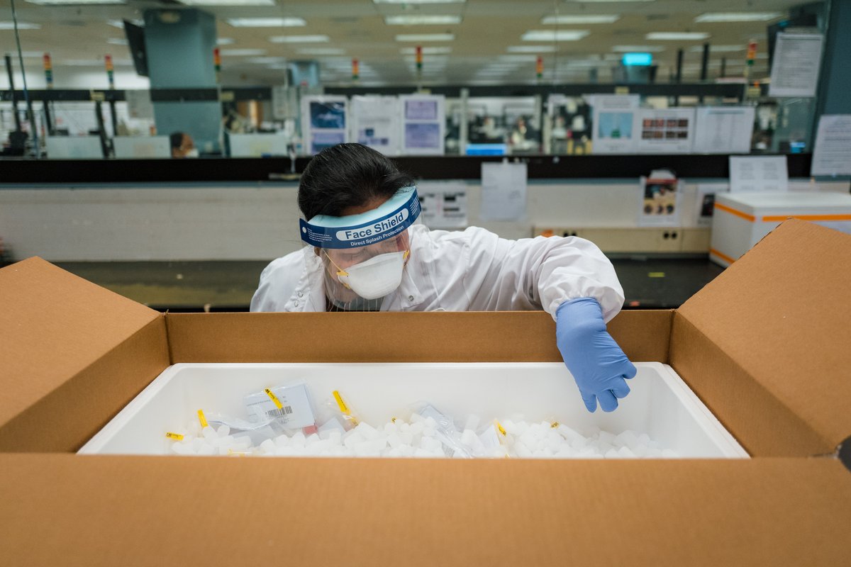 18. In Teterboro, lab technicians inputed the names of patients on a computer, creating a manifest for the samples (like a plane manifest, except for test tubes). They packed them in dry ice. We went home, had dinner & came back at 1 am to see the samples leave for the airport: