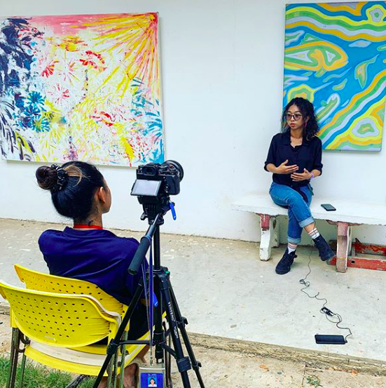 Liger senior Soliday (in yellow chair) is combining her passion for filmmaking and her advocacy efforts for the arts community. Soliday is making a documentary about the young artists of Cambodia, highlighting their successes alongside their struggles. #womeninfilm #artseducation